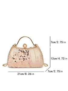Detailed view of champagne gold evening clutch with dimensions 21x12x7cm and pearl buckle