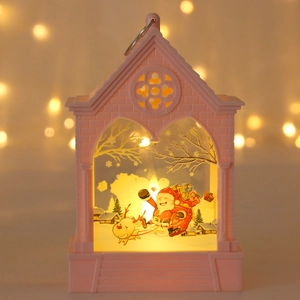 Pink house-shaped Christmas lantern with warm LED light and Santa Claus deer scene