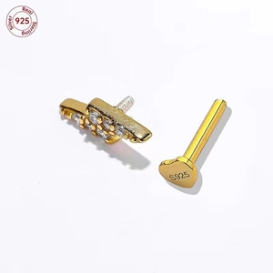 Gold S925 sterling silver heart stud earring with zircon stone on white background