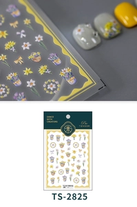 Macro detail of 3D embossed floral nail stickers featuring narcissus and woven baskets