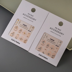 Luxury gold and silver K9 nail art sets with rhinestones and hollow metal curves