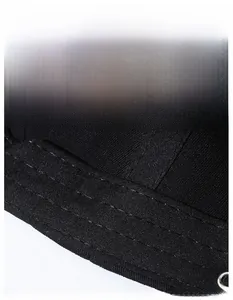 Detail of the wide sweatband and reinforced stitching on the black baseball cap