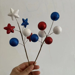 Close-up of patriotic red white and blue star and berry branches for USA Independence Day