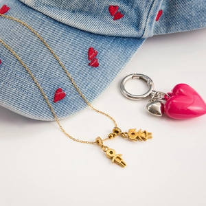 18K gold plated stainless steel necklace with boy and girl pendants on denim hat