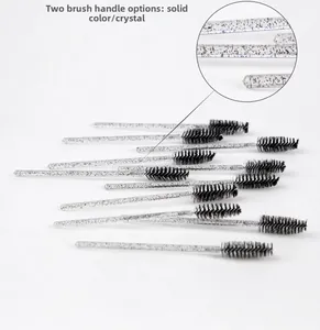 Detail of disposable crystal wand eyelash brushes with spiral heads and black fiber bristles