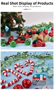 Detail shot of assorted Christmas tree ornaments including red truck and candy shapes