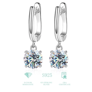 Detail of round cut moissanite earrings with four-prong setting in S925 sterling silver