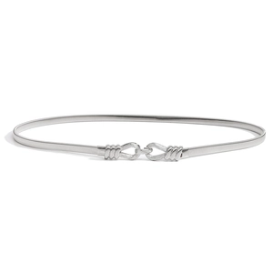 Close-up of elegant silver spring metal chain belt with interlocking buckle for women