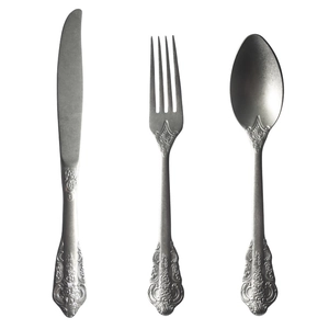 Vintage 304 stainless steel cutlery set with embossed handles including knife fork and spoon