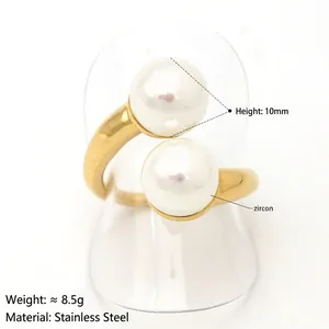 Adjustable golden stainless steel open ring with dual 10mm white zircons on display