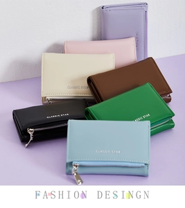 Multiple colors of minimalist leather wallets with zippers and CLASSIC STAR branding