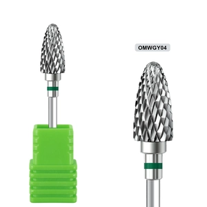 Macro detail of alloy nail drill bit with green base showing precision cross texture