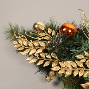 Golden Christmas PVC hanging ornament with metallic leaves and festive pine needle details