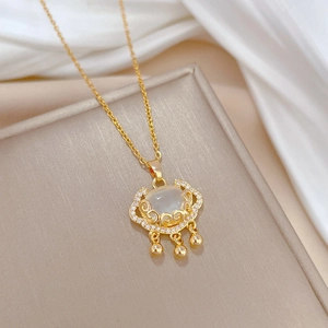 Elegant gold titanium steel long life lock necklace with white stone and tassel detail