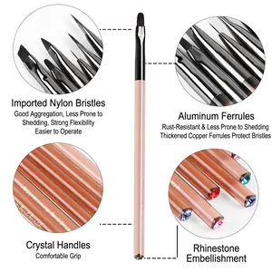Acrylic nail art brush set with champagne handles and crystal rhinestone detailing