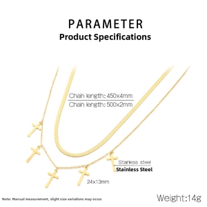 Detail of gold double-layered stainless steel necklace with cross pendant and snake chain