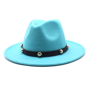 Detailed shot of teal wool fedora hat featuring black band with gold round studs