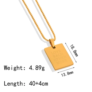 Detailed view showing dimensions of a gold titanium steel engraved pendant necklace