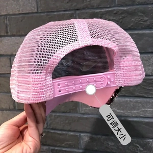 Pink sequin trucker hat detail showing adjustable snapback closure for custom fit