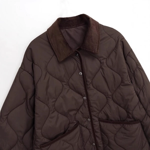 Dark brown quilted jacket with corduroy collar and snap button front for women