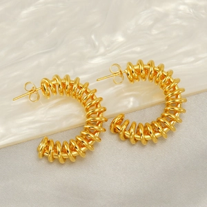 Chic golden spiral spring C-shape hoop earrings with hollow industrial texture design