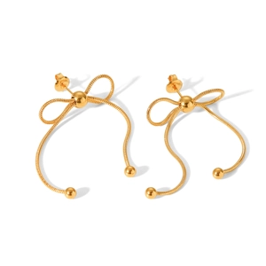 Close-up of 18k gold plated stainless steel snake chain bow earrings with metal beads