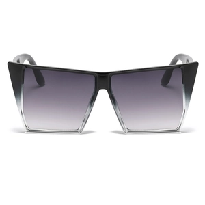 Futuristic square oversized sunglasses with black gradient frames and cat-eye lenses