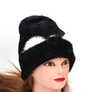 Winter plush cat ear beanie in black and white contrast for stylish thermal warmth