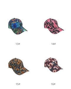 Detail showcasing four stylish digital printed baseball caps in a grid display