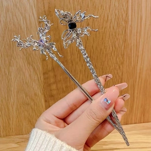Silver liquid metal butterfly hair pin with dark blue crystal jewel for women