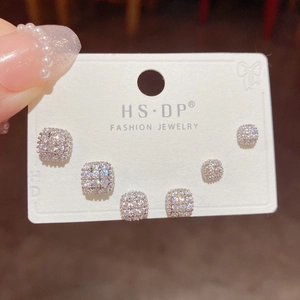 Detailed view of six sparkling S925 silver stud earrings with micro-set cubic zirconia
