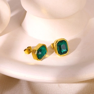 18k gold butterfly earrings featuring emerald-cut green cubic zirconia stones