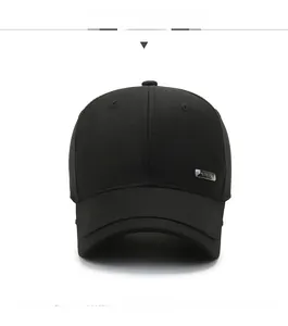 Front view of black cotton baseball cap with classic six-panel structure and metal side logo
