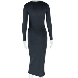 Detail view showing the sleek back silhouette and tailored fit of a black maxi dress