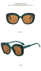 Detail of green and black dual-tone sunglasses frame with mesh texture and tea lenses