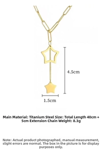 Macro detail of gold star pendant necklace in titanium steel with fringe chain design