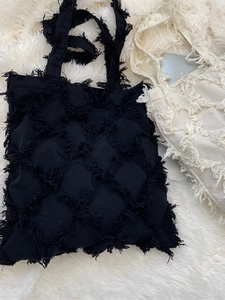Retro fringe canvas tote bag in black and off-white with frayed diamond pattern design