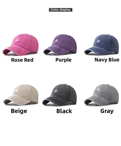 Color display of washed cotton baseball caps with letter U embroidery in six various tones