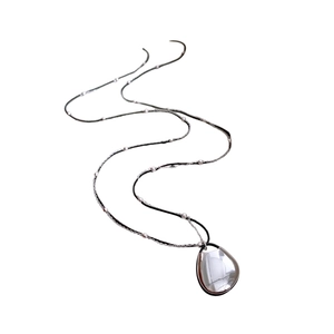 Minimalist double-layer silver teardrop pendant necklace with black cord and beads