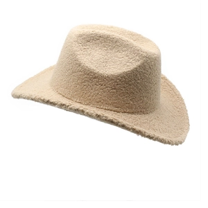 Detail of beige teddy fleece western cowboy hat showing soft curly fiber texture