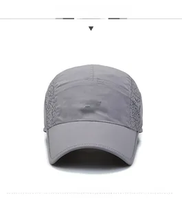 Front view of dark grey quick-dry sports cap with polygon mesh stitching and logo