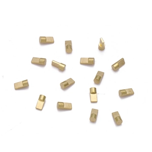 Macro detail of brass conductive pins for Bluetooth earbuds charging components