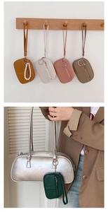 Mini PU leather coin purse displayed in four colors and hung on a silver handbag