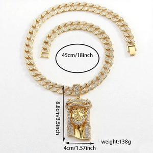 Hip hop gold plated Jesus piece pendant with cubic zirconia on a Cuban link chain