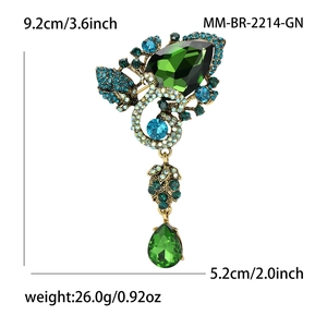 Vintage water drop brooch with green rhinestones and blue crystals on golden alloy base