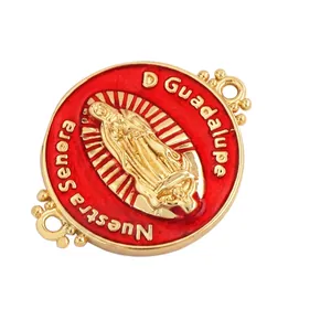 Detail of 18k gold plated Virgin Mary oval pendant connector with red enamel inlay