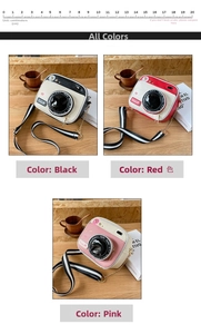 Detail view of small camera-shaped PU leather crossbody bag in black, red, and pink colors
