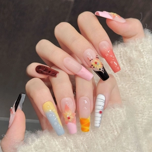 Floral patterned press-on nails with 3D water droplet effects and gradient finish