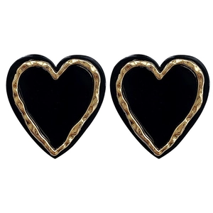 Retro black heart stud earrings with textured gold metallic edges on white background