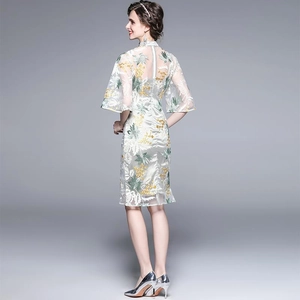 Elegant vintage silver Qipao dress with floral lace embroidery and flared sleeves